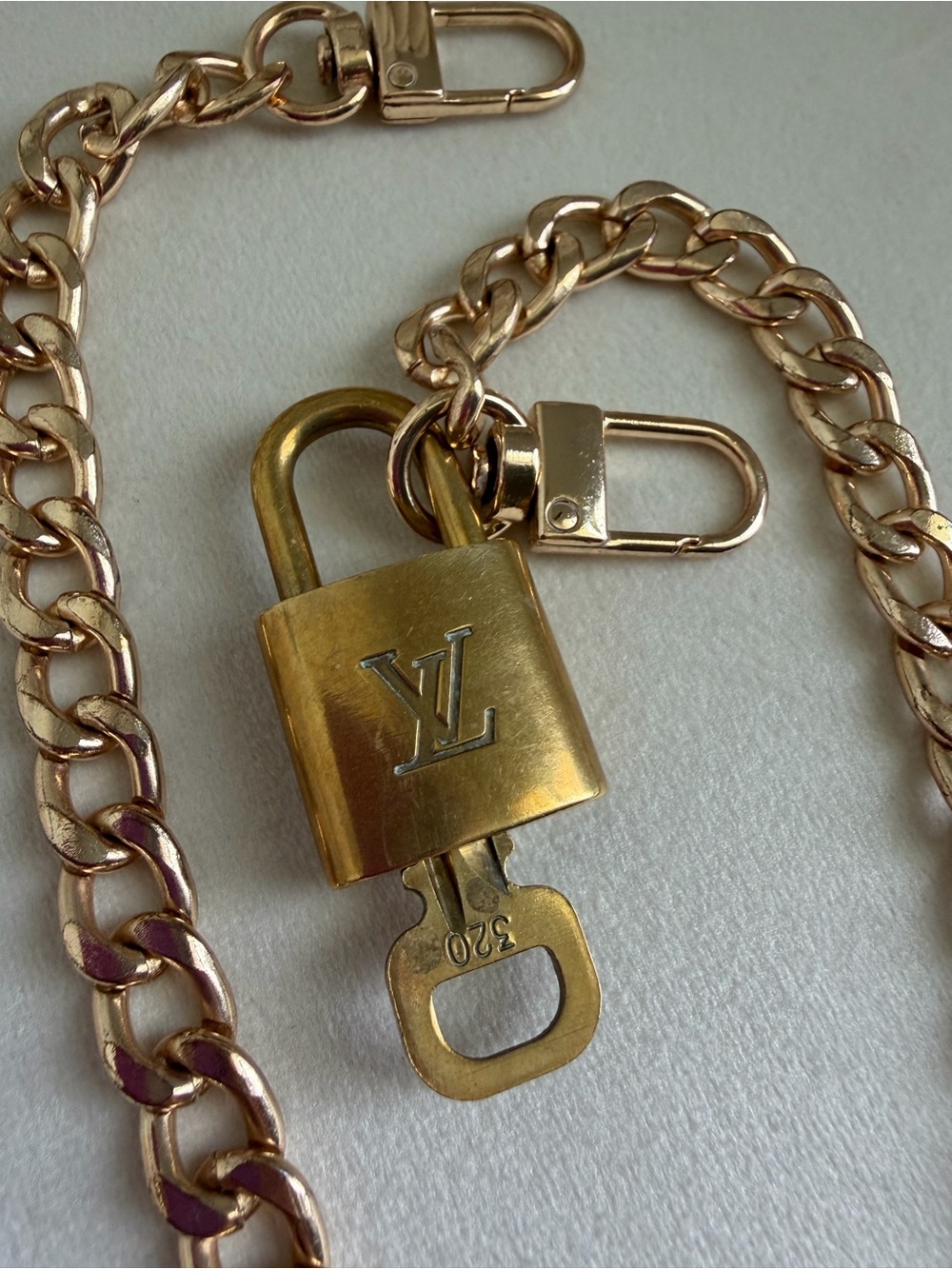 Louis Vuitton Gold Padlock Key Bag Charm- Gold Tone
